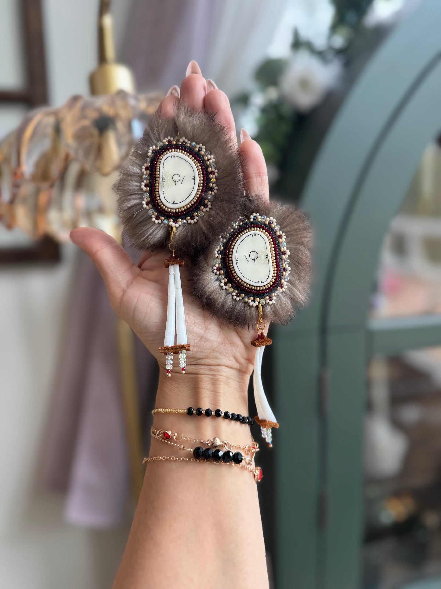 Ivory and otter fur earrings