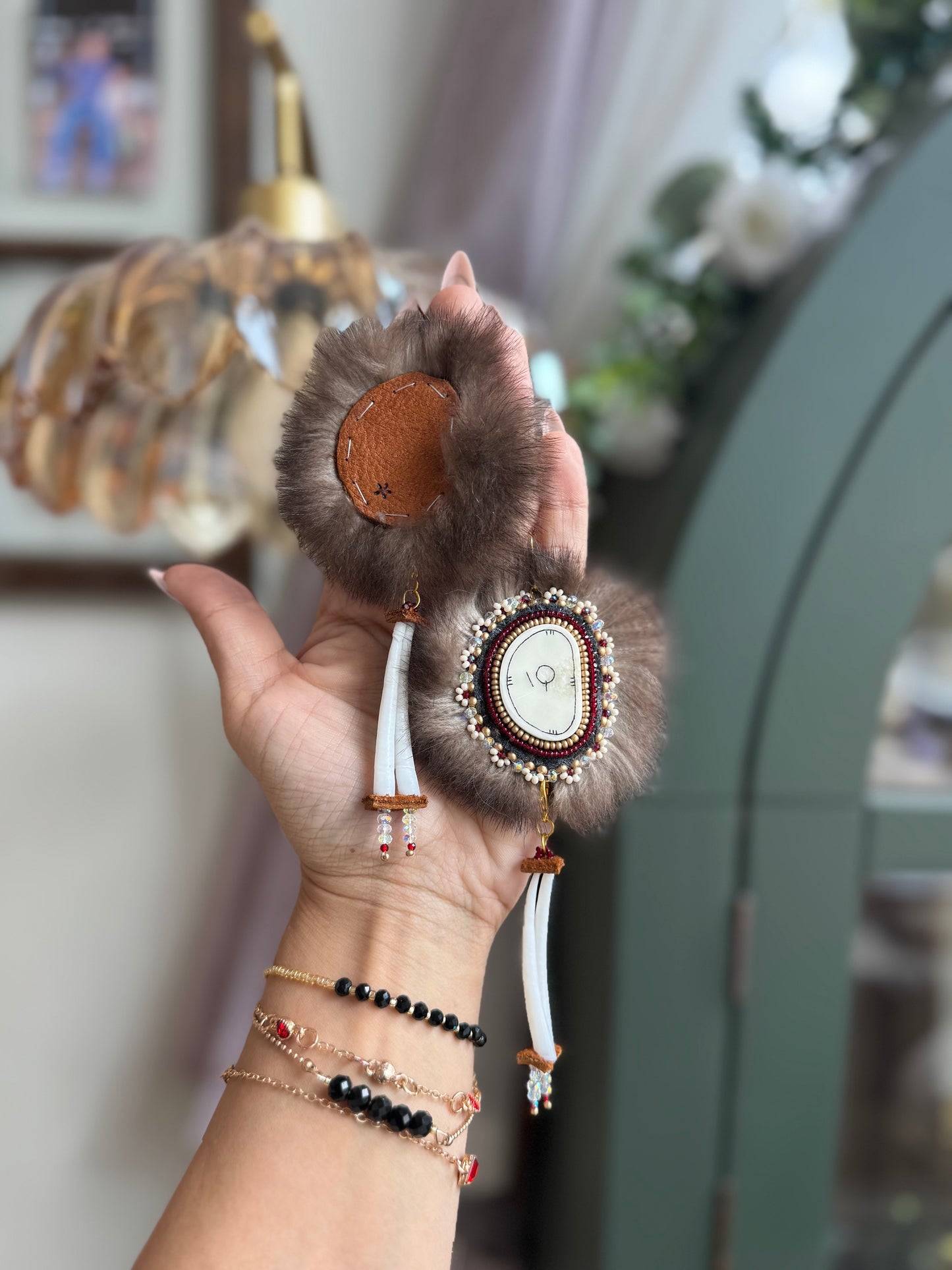 Ivory and otter fur earrings